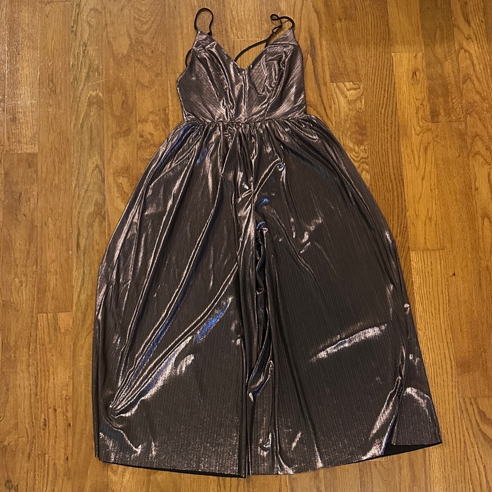 Urban Outfitters is Shimmering Metallic Jumpsuit size medium
